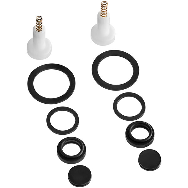 A group of black and white rubber rings and seals.