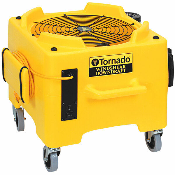 A yellow Tornado Windshear downdraft machine on wheels.