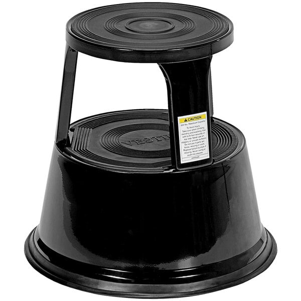 A black steel rolling step stool with a white label on the top step.
