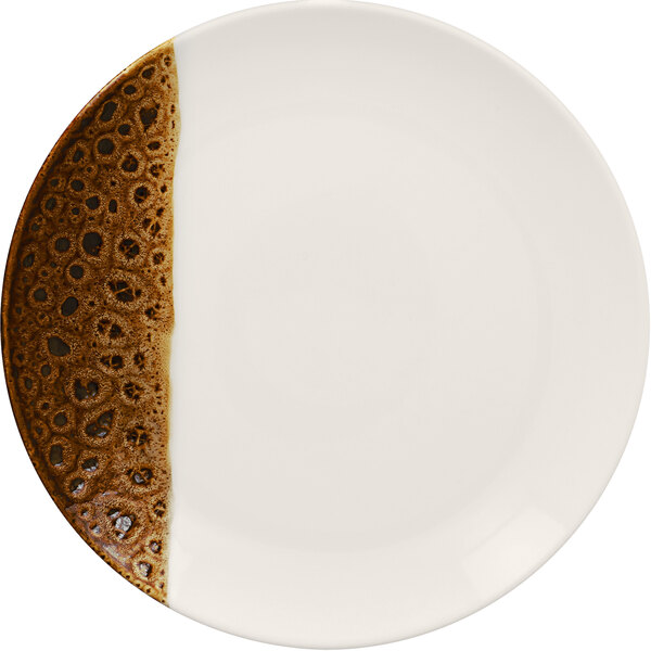 A white porcelain RAK plate with a brown design.