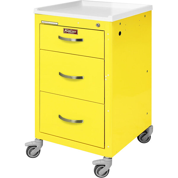 A yellow Harloff medical isolation cart with three drawers.