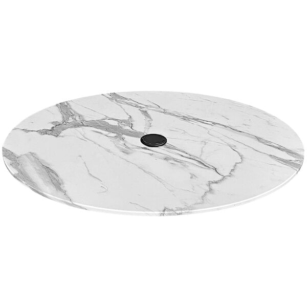 A white marble table top with a black circle in the center.