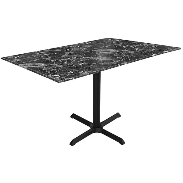 A black marble Holland Bar Stool EuroSlim table with a metal base.