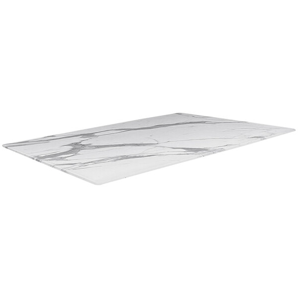 A white rectangular marble table top with black lines.