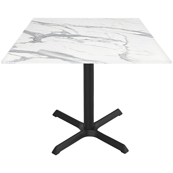 A white marble Holland Bar Stool table with a black base.