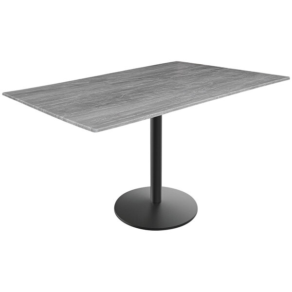 A Holland Bar Stool EuroSlim Greystone table on a black round base.