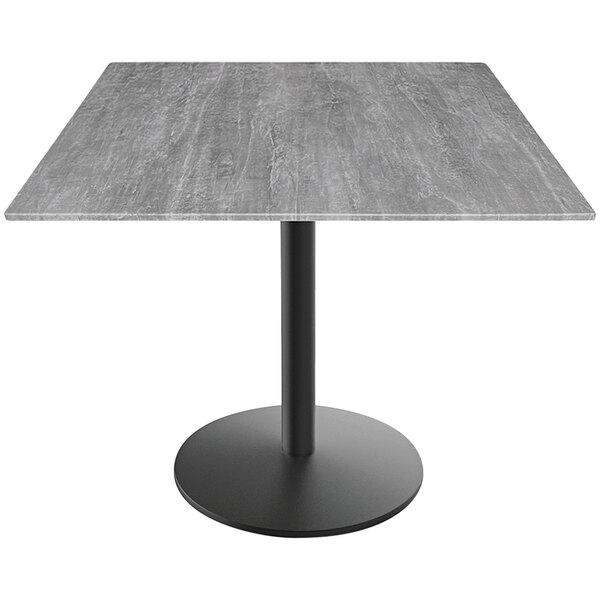 A Holland Bar Stool EuroSlim standard height table with a black base and grey top.