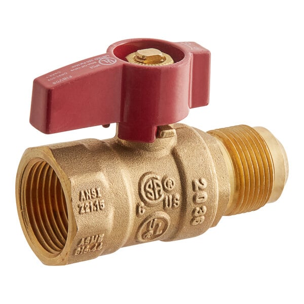A close up of a brass Easyflex gas valve with a red handle.