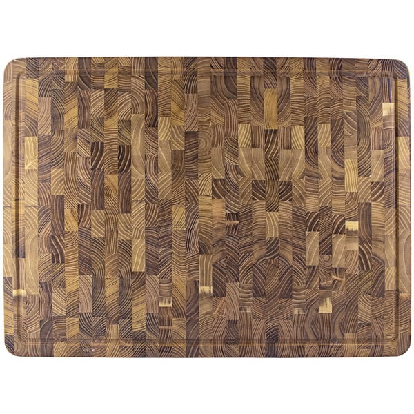 A Pinnacolo Teak end grain cutting board with a patterned wood surface.