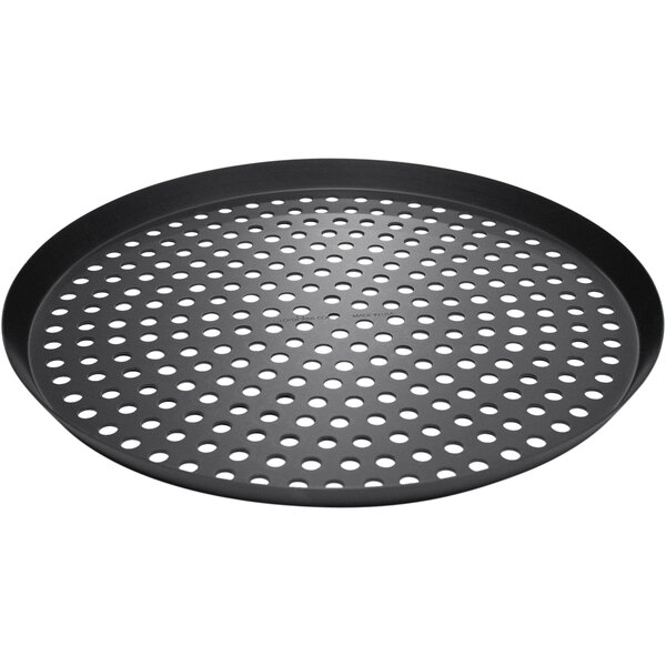 A round black pan with holes.