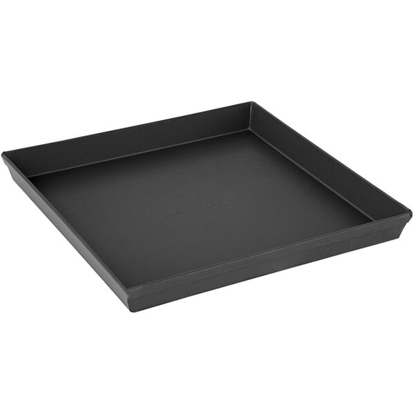 A black LloydPans square pizza pan on a table.