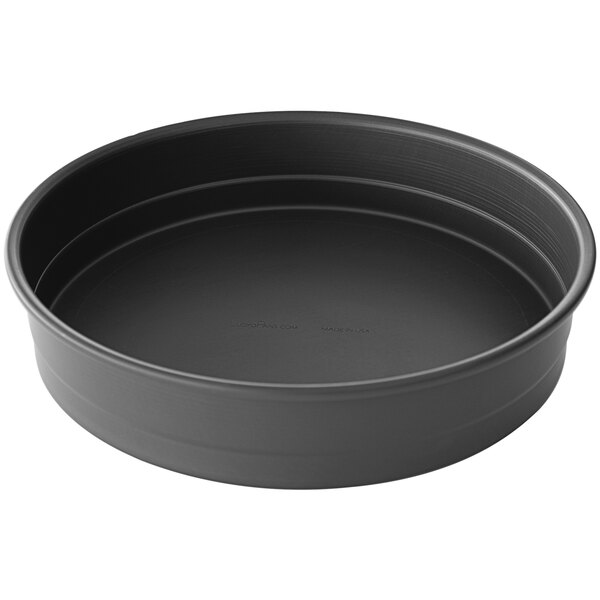 A black LloydPans stackable deep dish pizza pan with a white background.