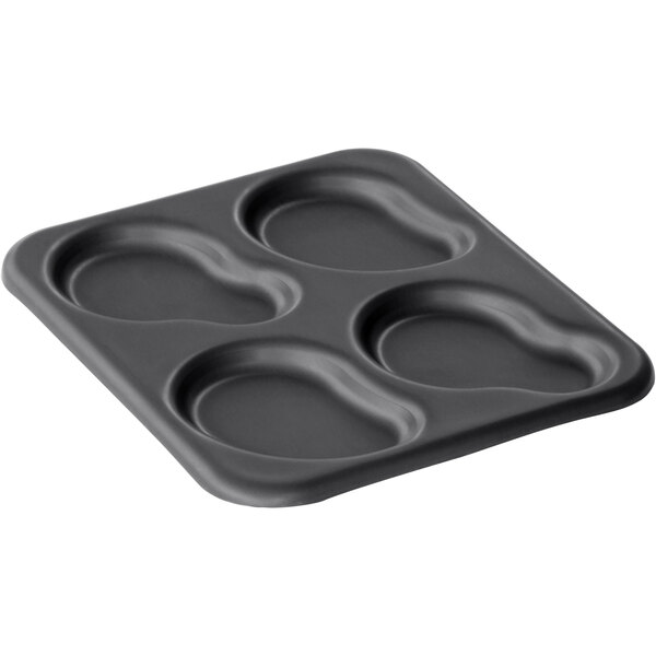 A black LloydPan irregular egg pan with four circles.