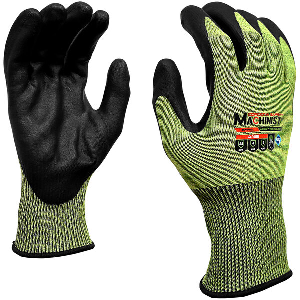 A pair of green Cordova machinist gloves with black foam nitrile palm coating and yellow trim.