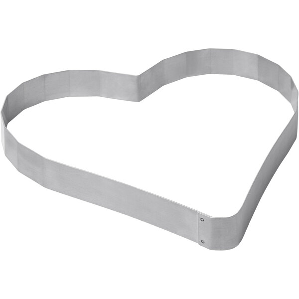 A LloydPans stainless steel heart shaped metal mold.