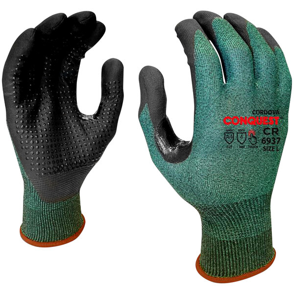 A close-up of a pair of green Cordova Conquest gloves with black nitrile coating and nitrile dots.
