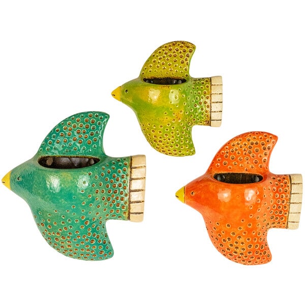 A group of colorful bird shaped vases with holes in them.