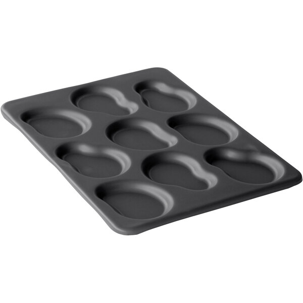 A black baking tray with 9 irregular egg compartments.