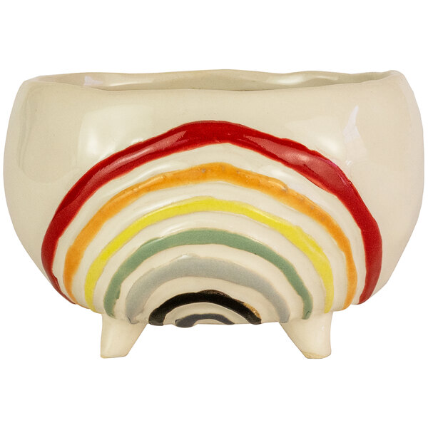 A white ceramic bowl with a rainbow design.