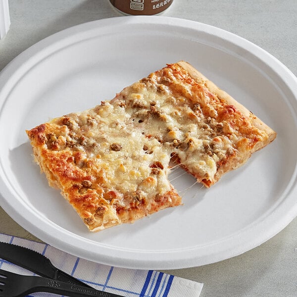 A slice of MAX Whole Grain Breakfast Pizza on a plate.