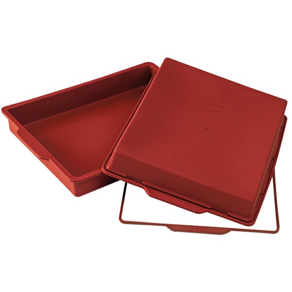 A red silicone baking mold with a lid on it.