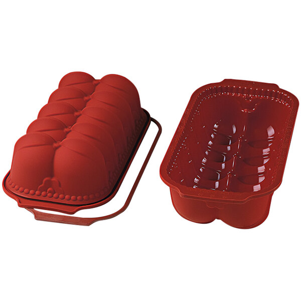 A red silicone loaf pan with a lid.