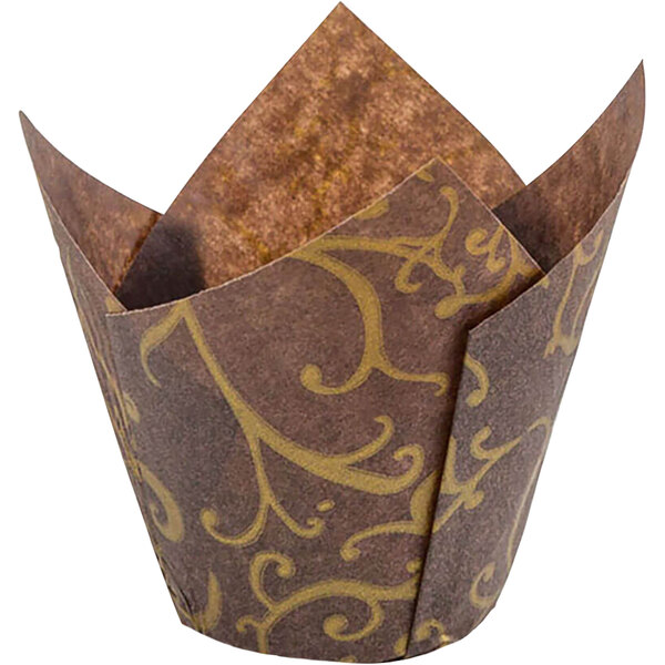 A brown paper Novacart tulip baking cup with a gold swirl pattern.