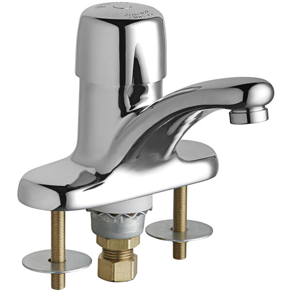 A Chicago Faucets deck-mounted metering faucet with two handles in chrome.