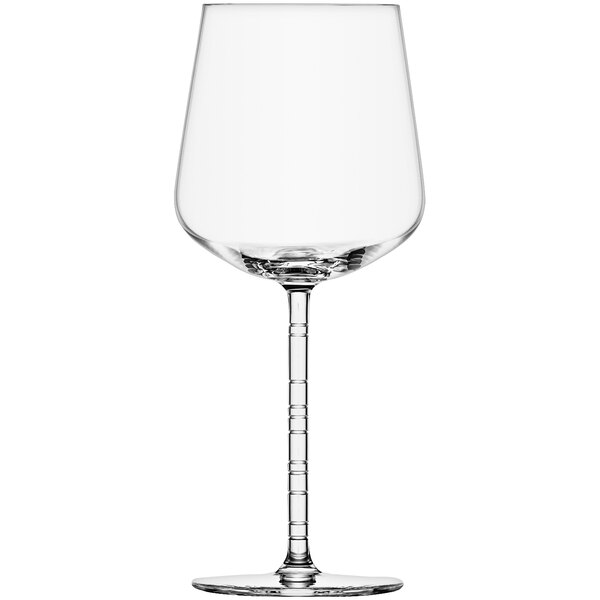 A close-up of a Schott Zwiesel clear wine glass with a stem.