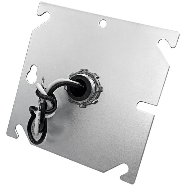 A metal plate with wires and a hook.