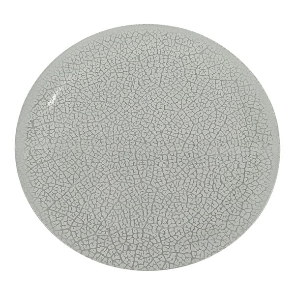 A set of two white glass platters with a crack pattern.