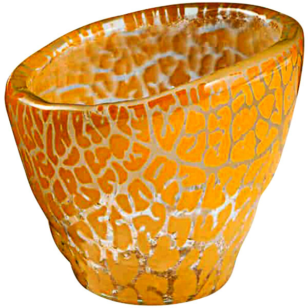 A close up of a Rosseto Kalderon round yellow mini glass bowl with a white pattern.