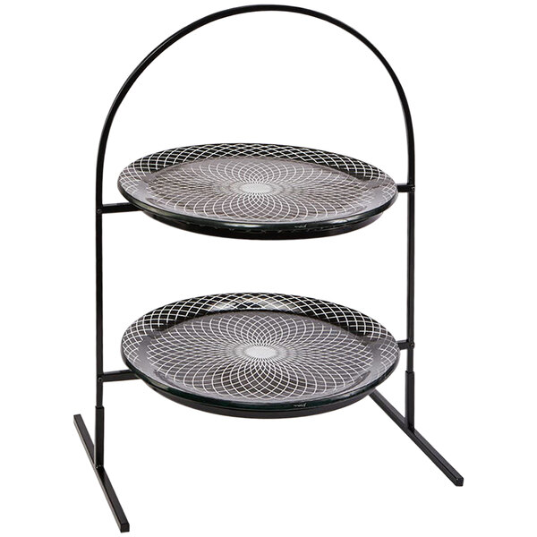A Rosseto two tiered round display stand with black and white glass platters.