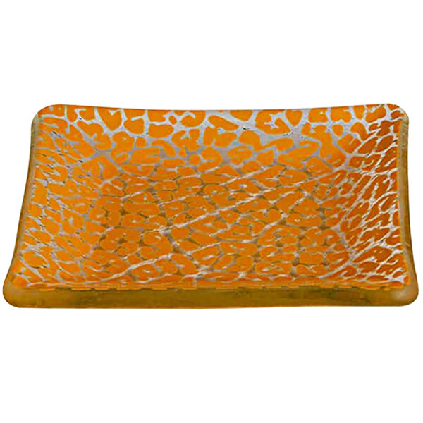 A square yellow glass mini plate with a leaf design.