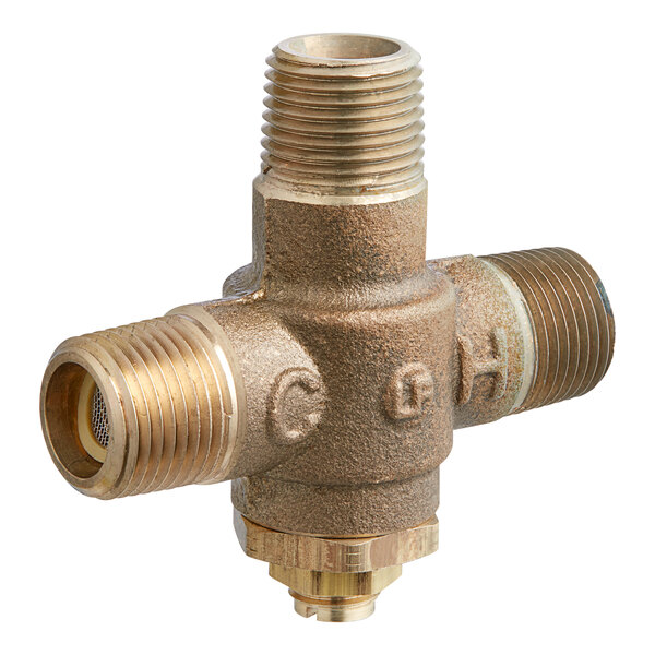 A brass Stiebel Eltron mixing valve with two holes.