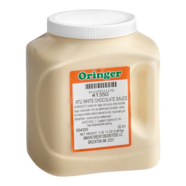 A container of Oringer White Chocolate Hard Serve Ice Cream Base, a white liquid.