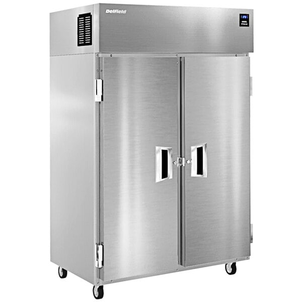 A large silver reach-in freezer with two doors.