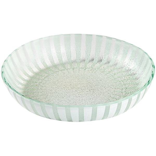 A set of 2 white glass bowls with green striped patterns on them.