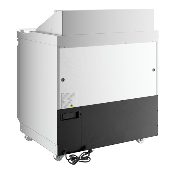 A commercial refrigerated sandwich prep table with a cutting top, two doors, and front-breathing design on casters.