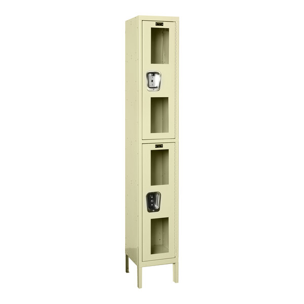 A tan metal wardrobe locker with two compartments.