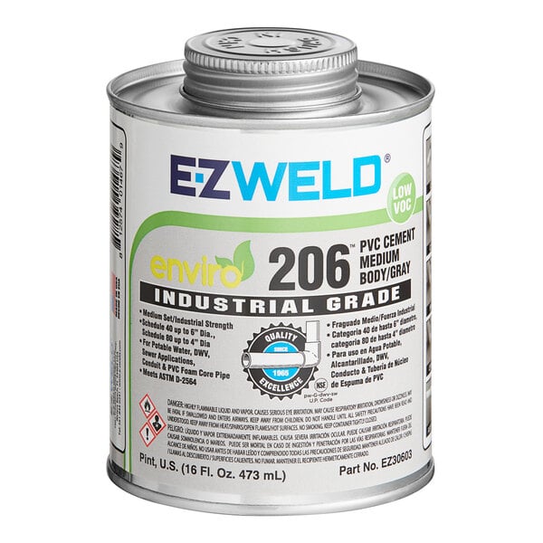 A white E-Z Weld can of gray PVC cement with black and green text.