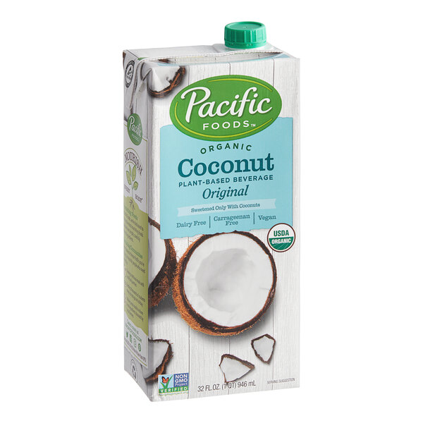 A case of 12 cartons of Pacific Foods Organic Coconut Milk with white and blue packaging.
