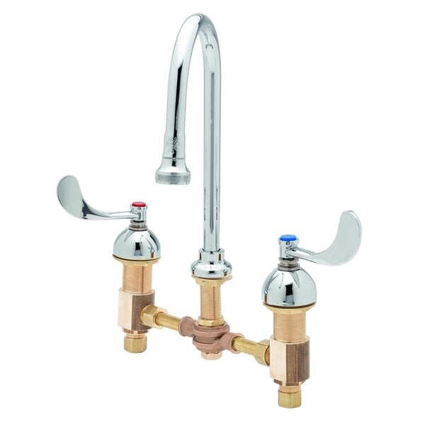A chrome T&S deck mount faucet with two gooseneck handles.