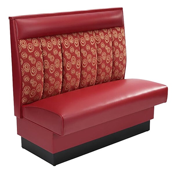 An American Tables & Seating red and black upholstered wall bench with a red cushion and gold accents.