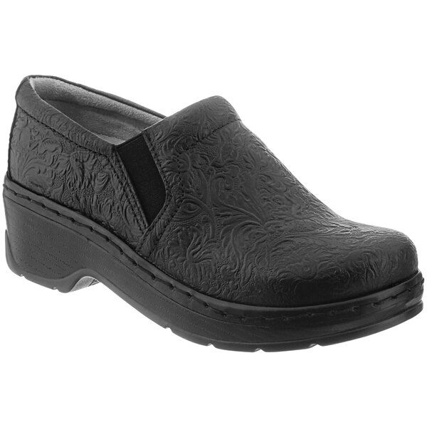 A pair of black Klogs women's clogs with a floral pattern.