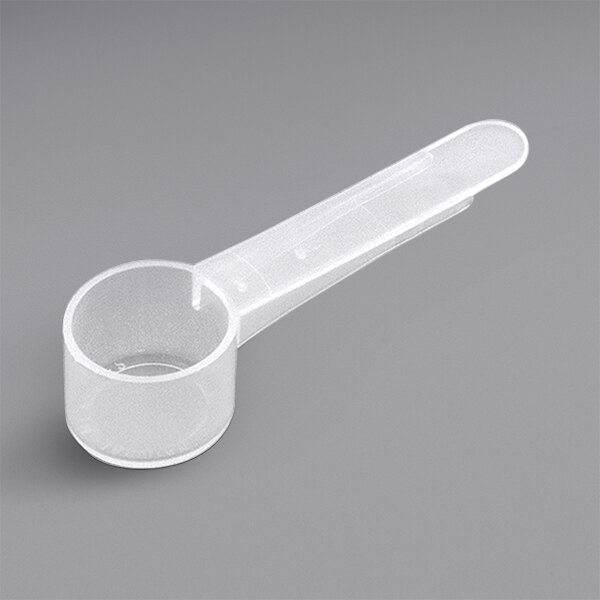 A close-up of a white 5 cc polypropylene scoop with a medium handle.