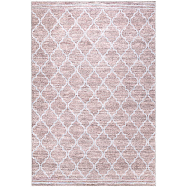 A cream area rug with a modern trellis pattern.