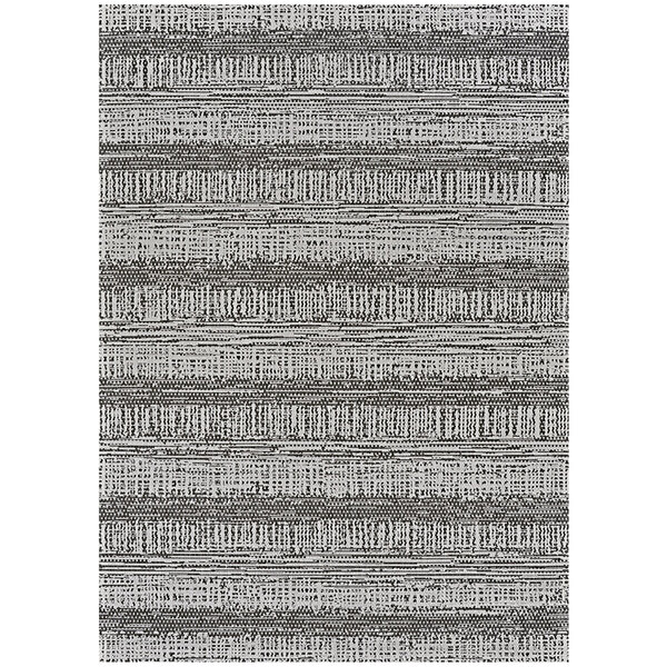 A close-up of a black and white textured Couristan Everhome Tangent area rug.
