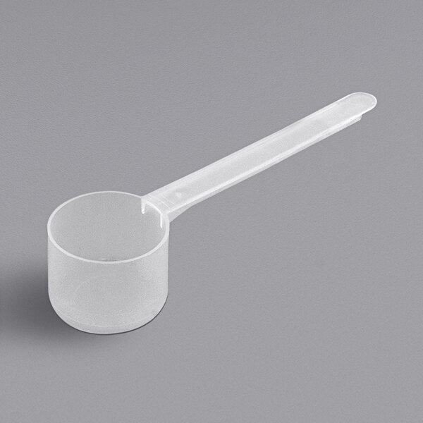A 35 cc polypropylene scoop with a long handle.
