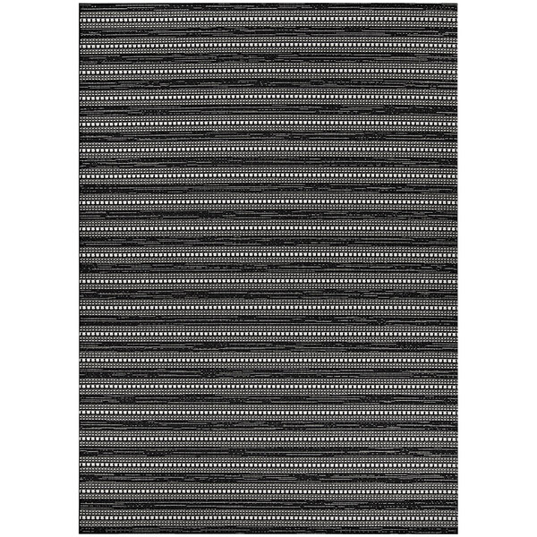A black and white striped Couristan area rug with a white border.